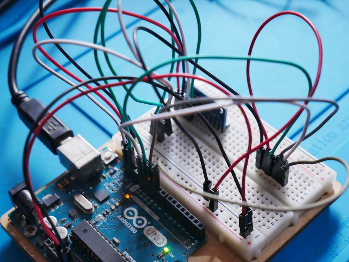 A microcontroller wired to sensors on a breadboard