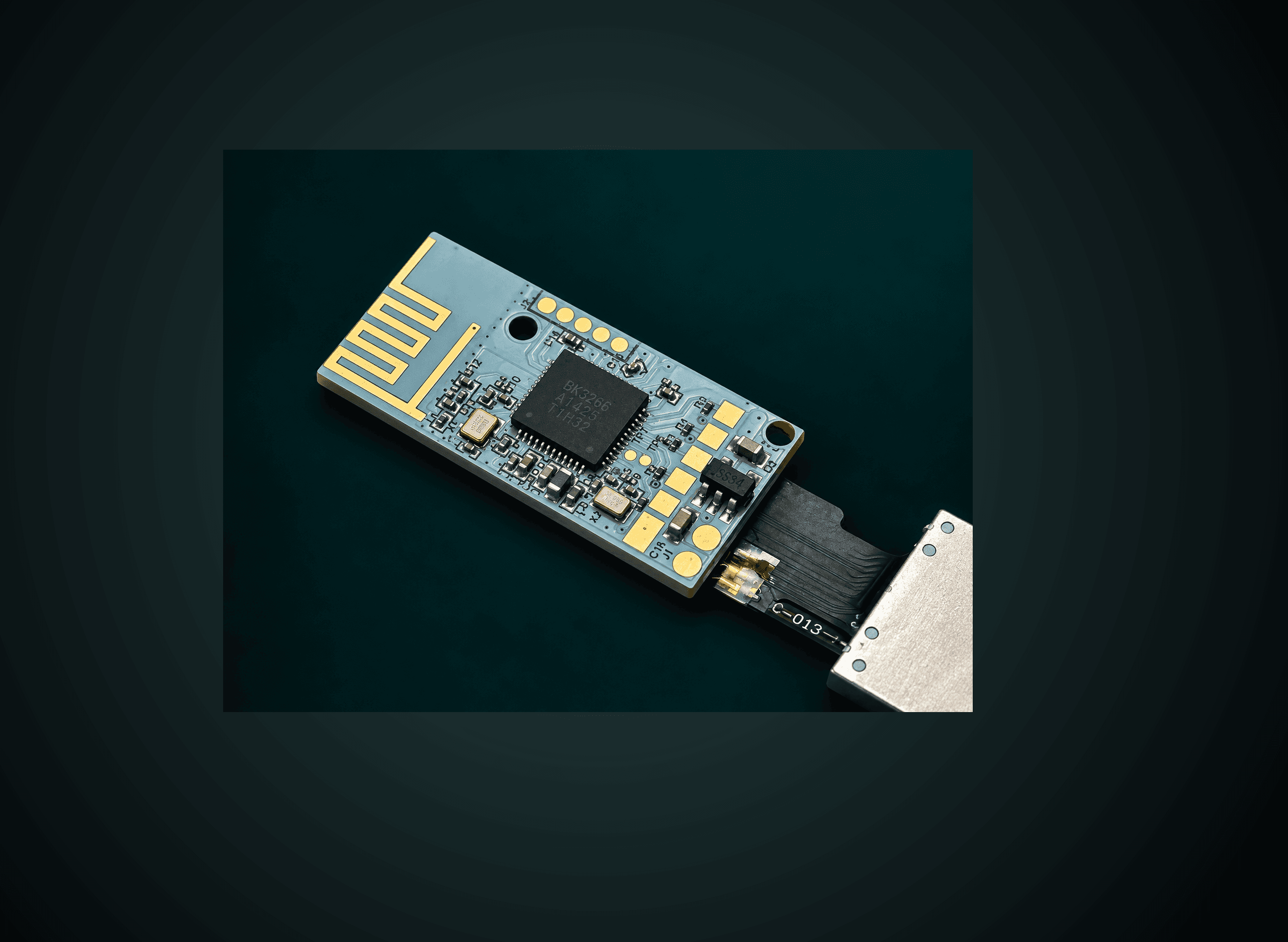 The BLE remote's populated radio board, showing its wireless SoC, PCB antenna, and flex connector to the button assembly