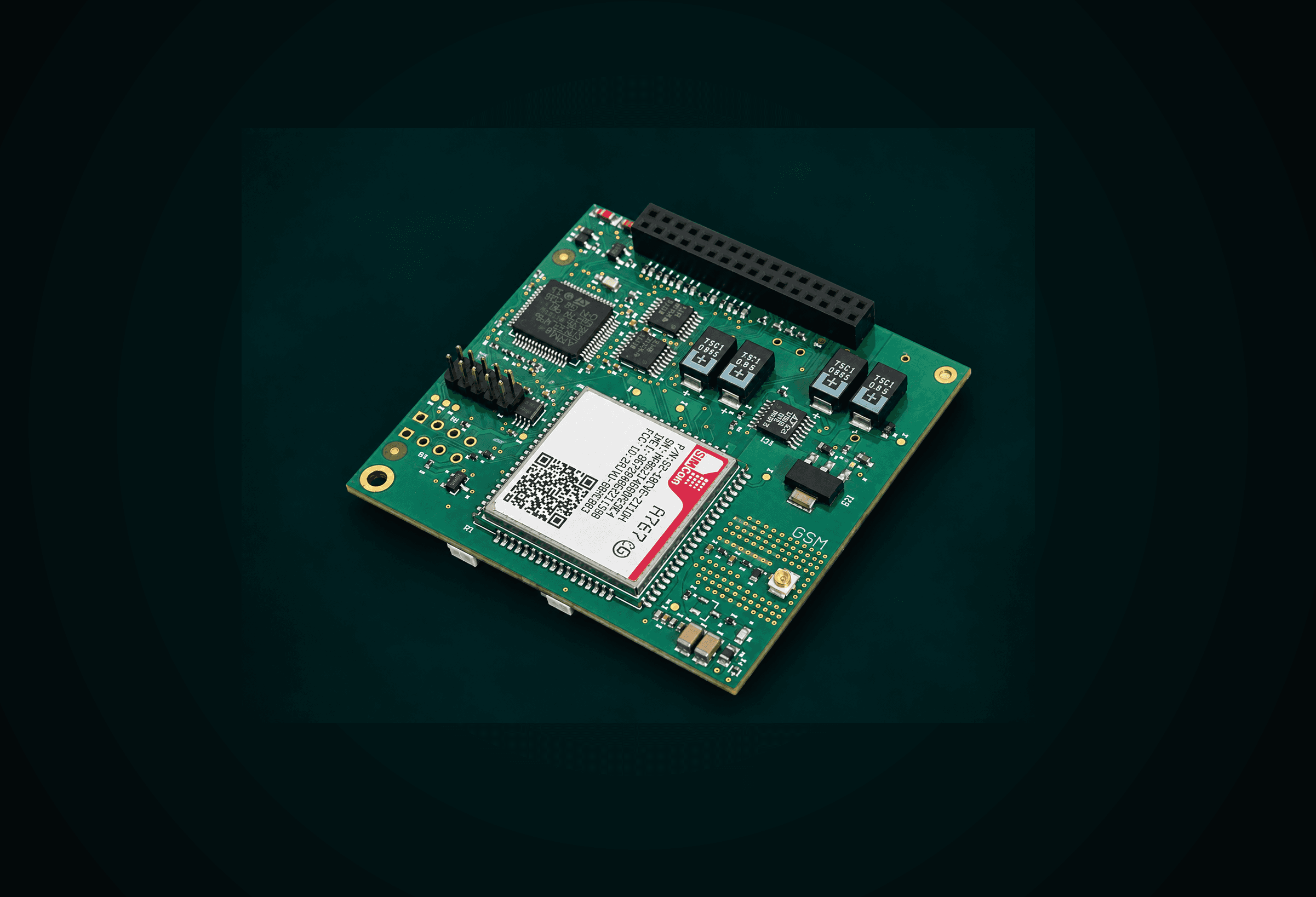 The populated cellular modem replacement board, showing its cellular module, host MCU, and legacy serial and antenna connectors