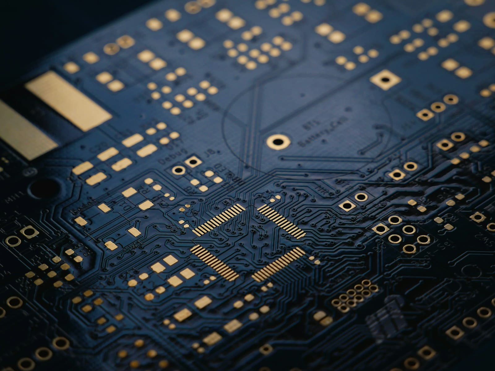 Close-up of a dark blue printed circuit board